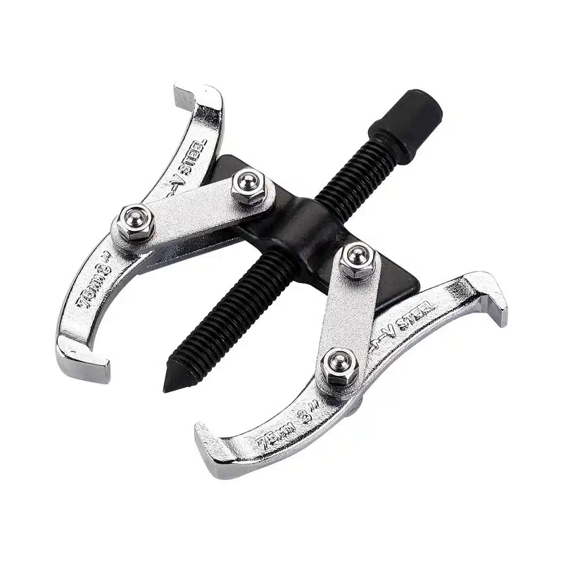 Extractor reversible de dos patas con husillo central